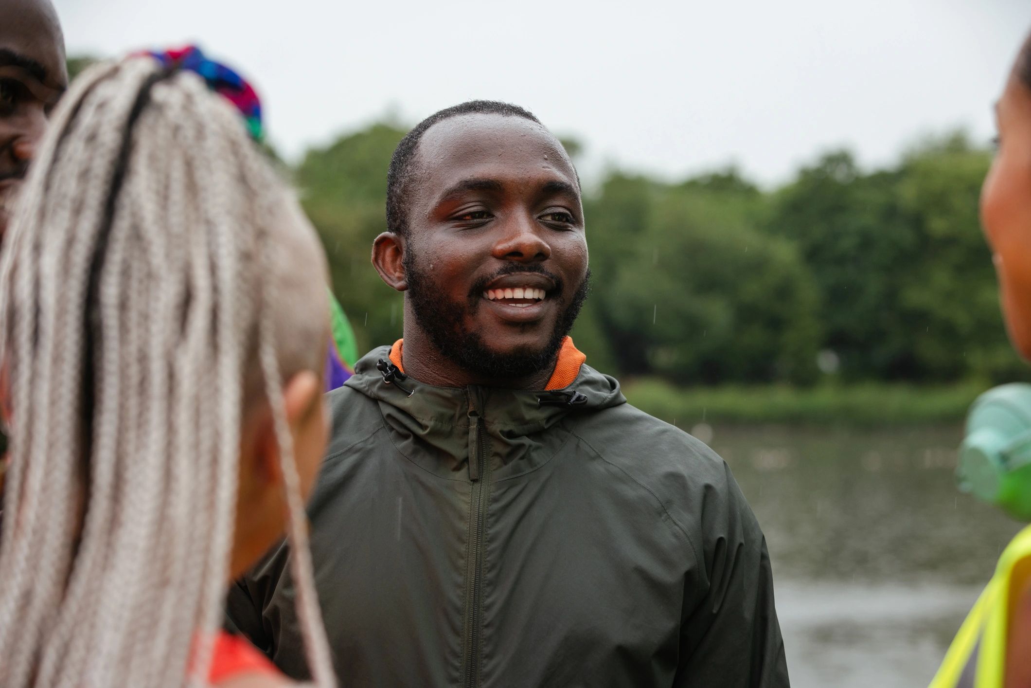 Black adults gathered together outdoors