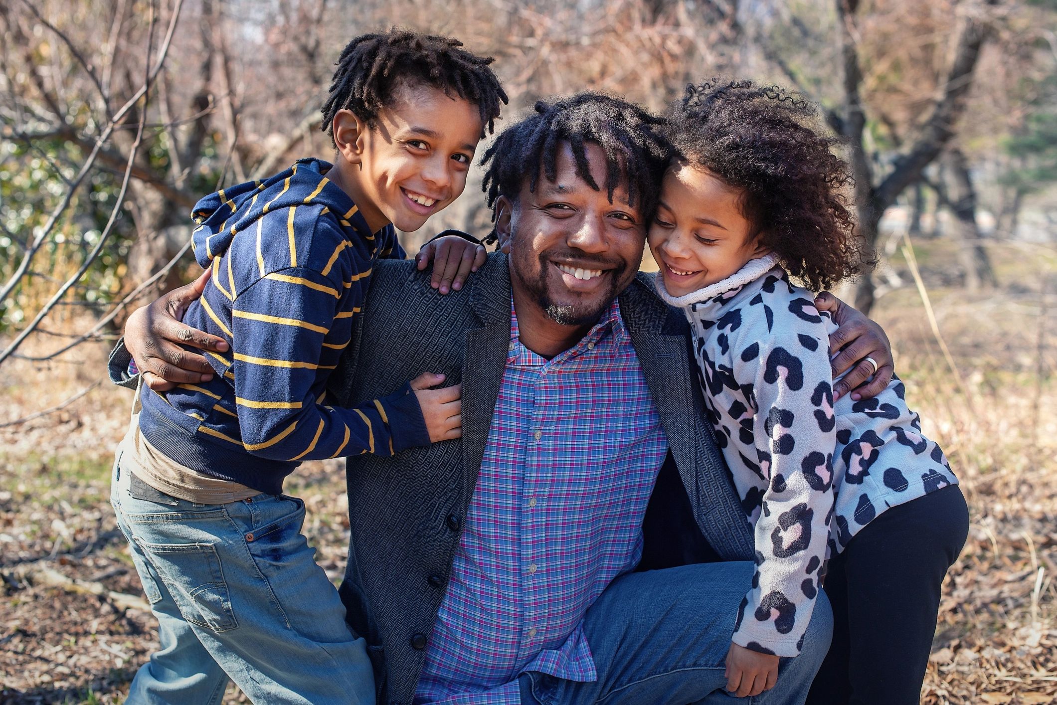 Black family portrait outdoors